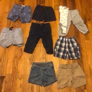 6 shorts and 2 pair of pants and 1 onesie